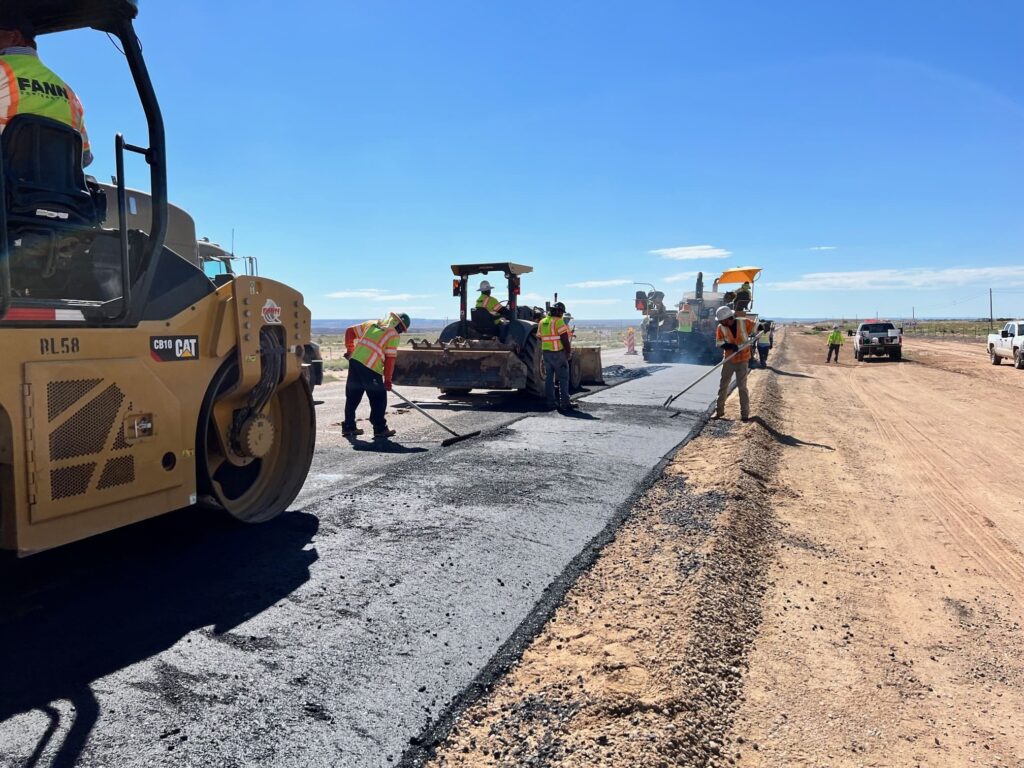 A group of workers are working on US 191 Chinle-Black Mountain Wash.