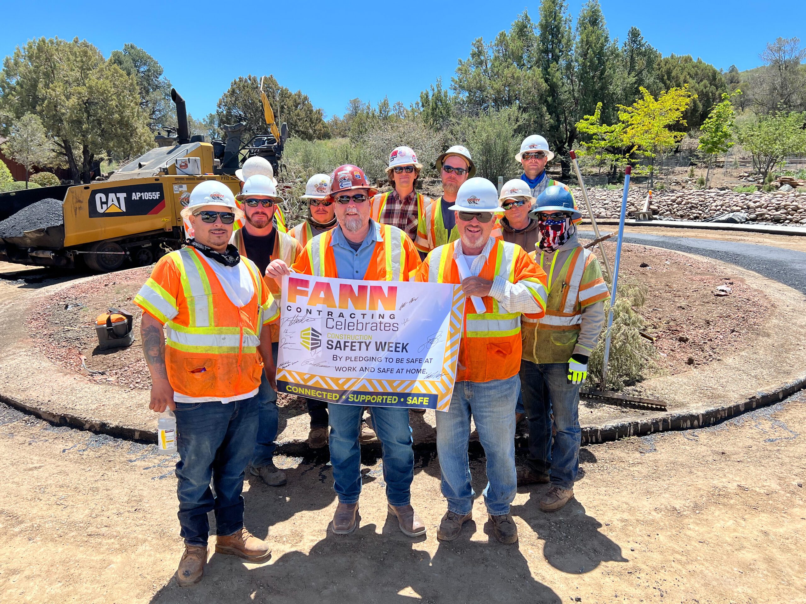 A group of construction workers celebrating Safety Week.
