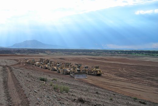 A group of bulldozers in the construction phase of Gray Wolf Landfill Cell.