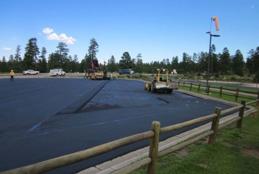 A Papillon Helicopter Parking Lot with a black asphalt overlay.
