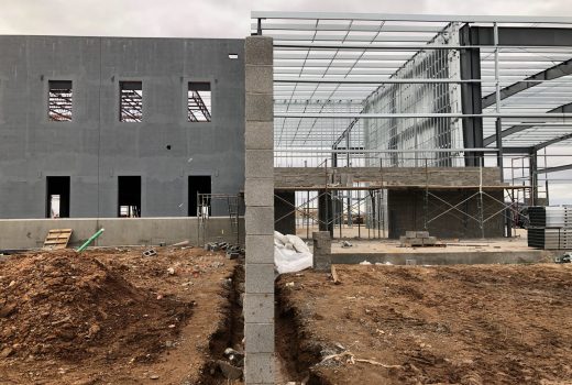 The construction of a steel building under construction.