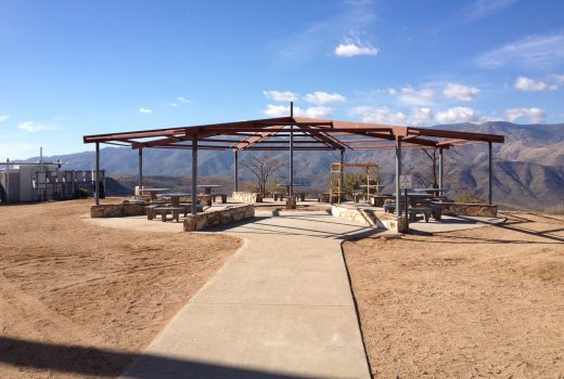 A metal structure in the middle of a desert at Sunset Point Rest Area on I-17.