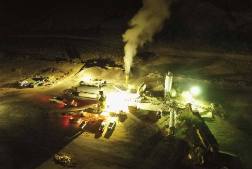 An aerial view of a mining site at night located near Phoenix-Cordes Junction Hwy.