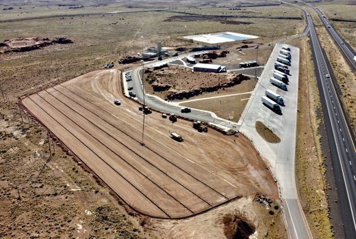 An aerial view of a construction site in the desert.